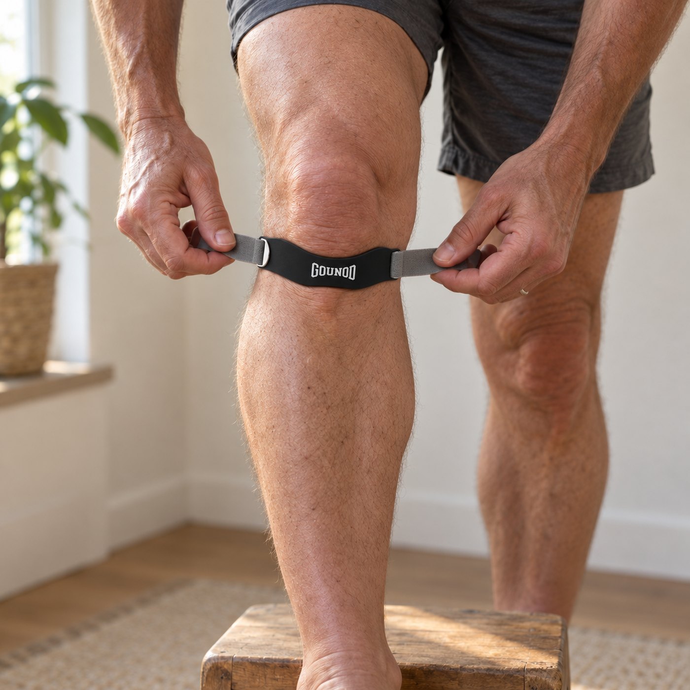 Placing the slim knee strap in the soft dip just below the kneecap
